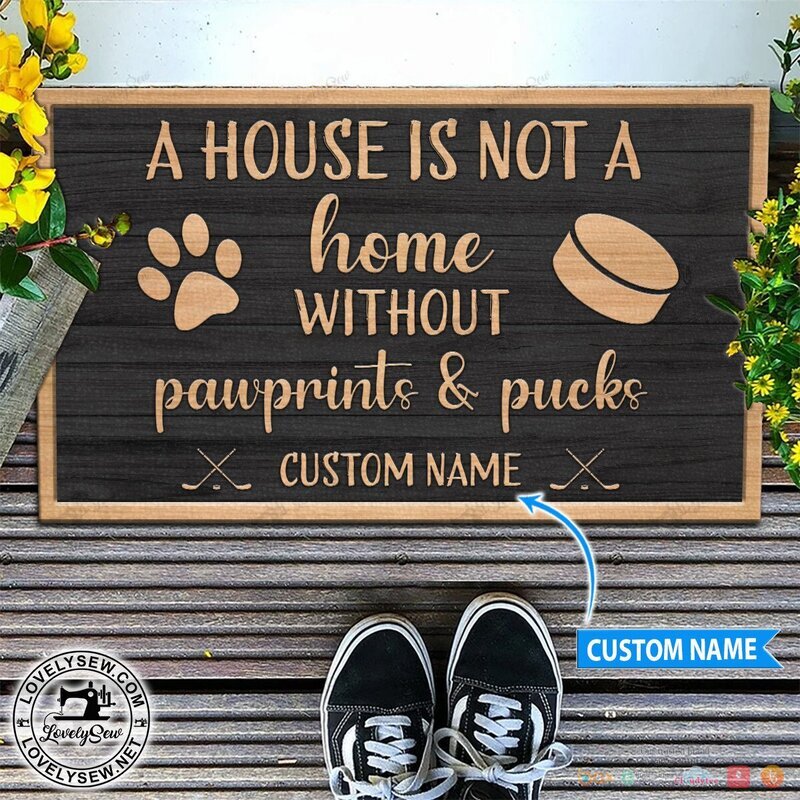 Personalized A house is not a home without pawprints and puck doormat