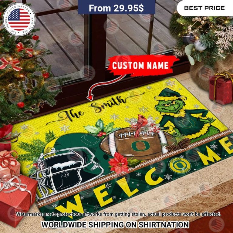 oregon ducks grinch christmas welcome personalized doormat 1 635.jpg