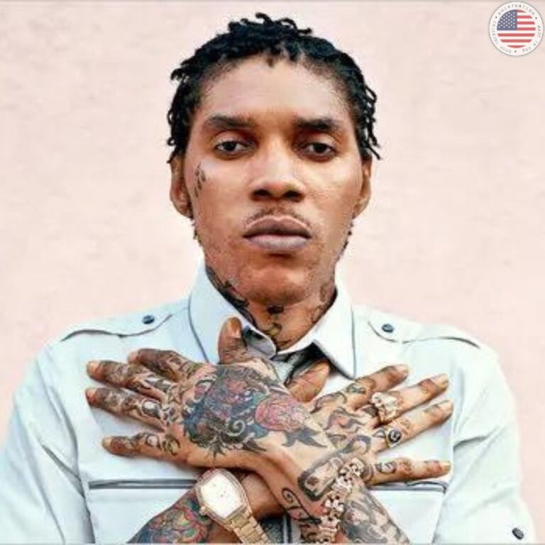 Vybz Kartel, known for his iconic hand gesture, often holds up his index finger and thumb to form a _W_ shape, representing his nickname _Worl' Boss._ The _Worl' Boss_ hand sign has become synonymous with Vybz Kar